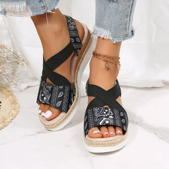 ComfySole Bahama Wedges in Black Paisley woman wearing
